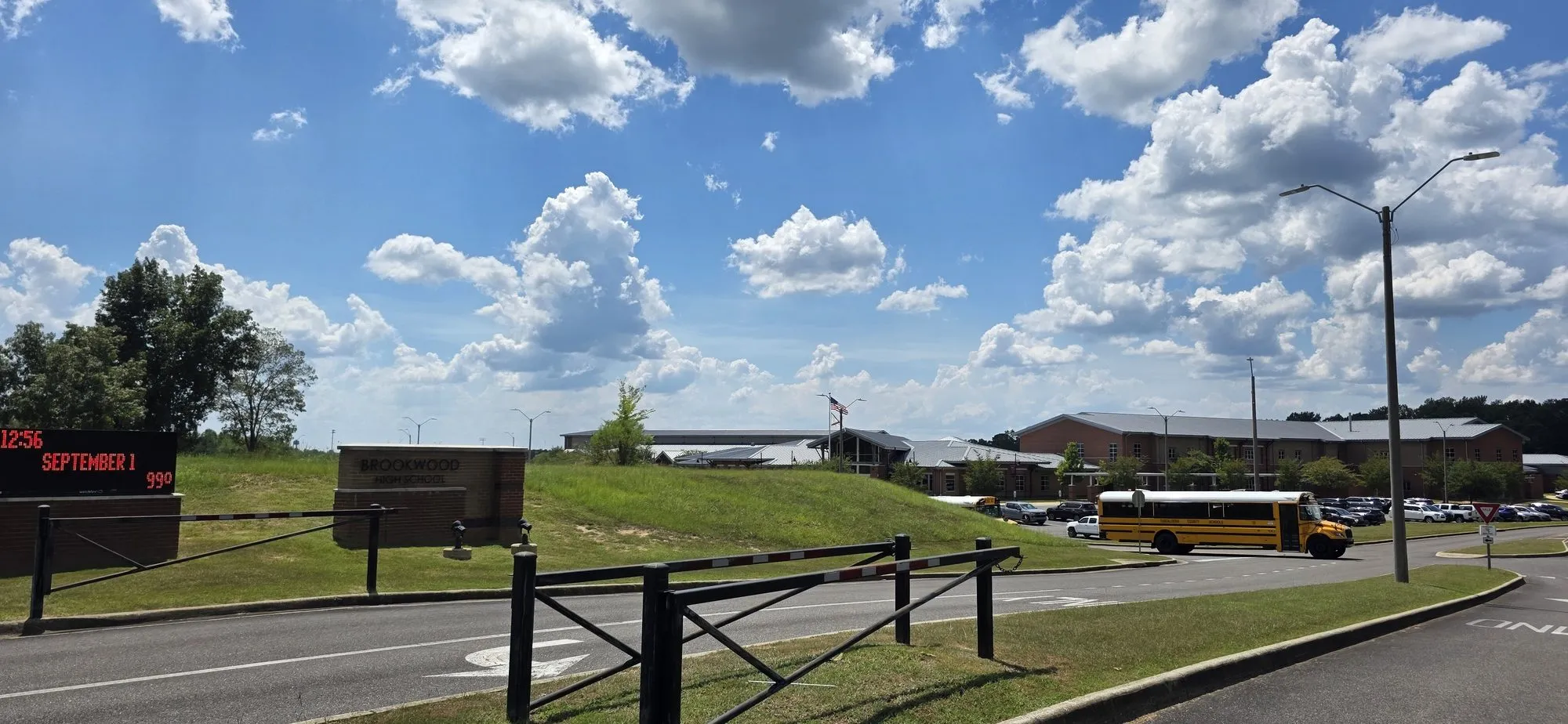 Brookwood High School and its marquee from the road into town