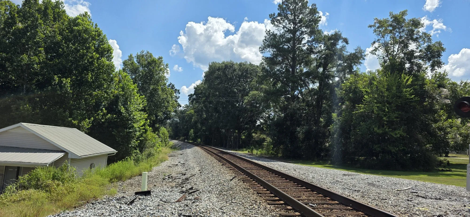 Rail line running alongside the road through Coaling
