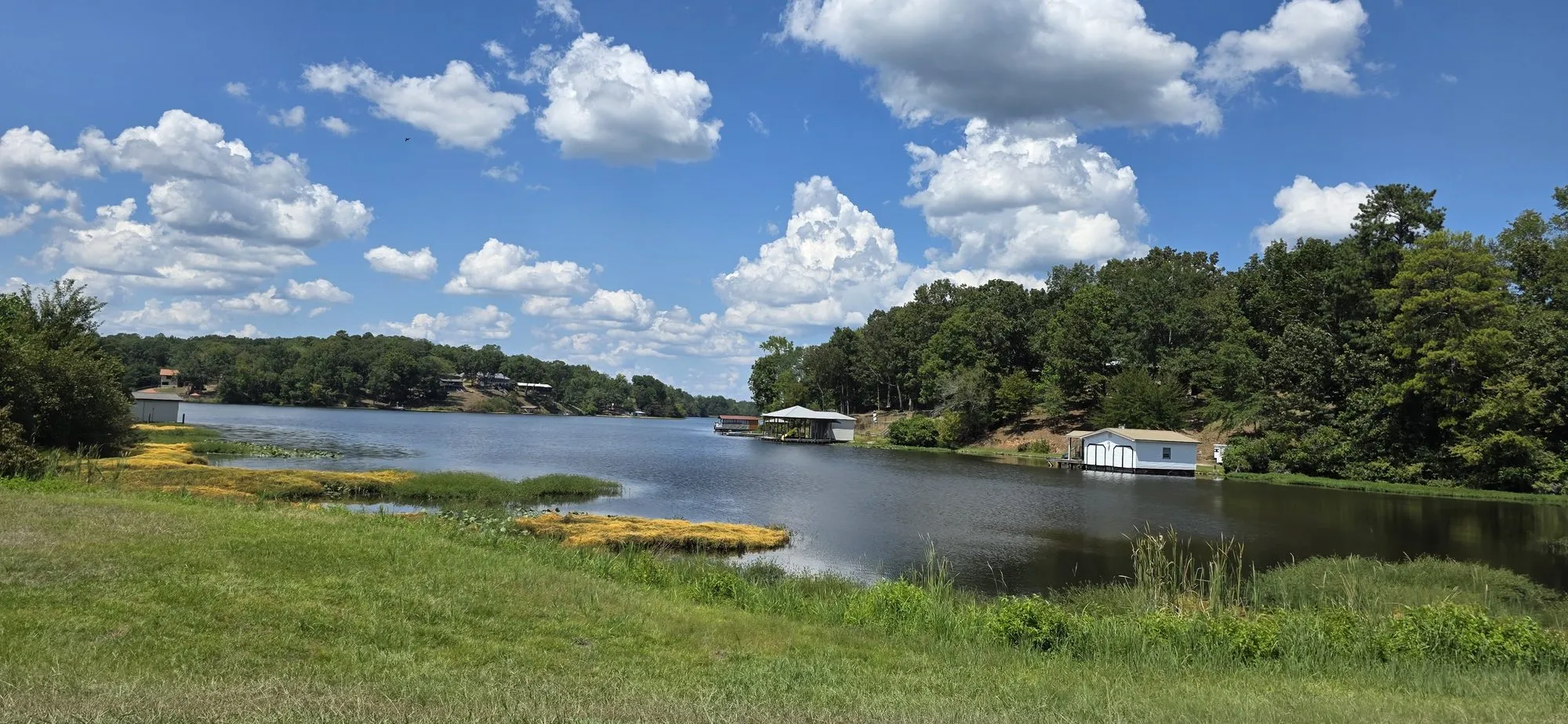 The lake at Lake View, with boat houses along the far shore