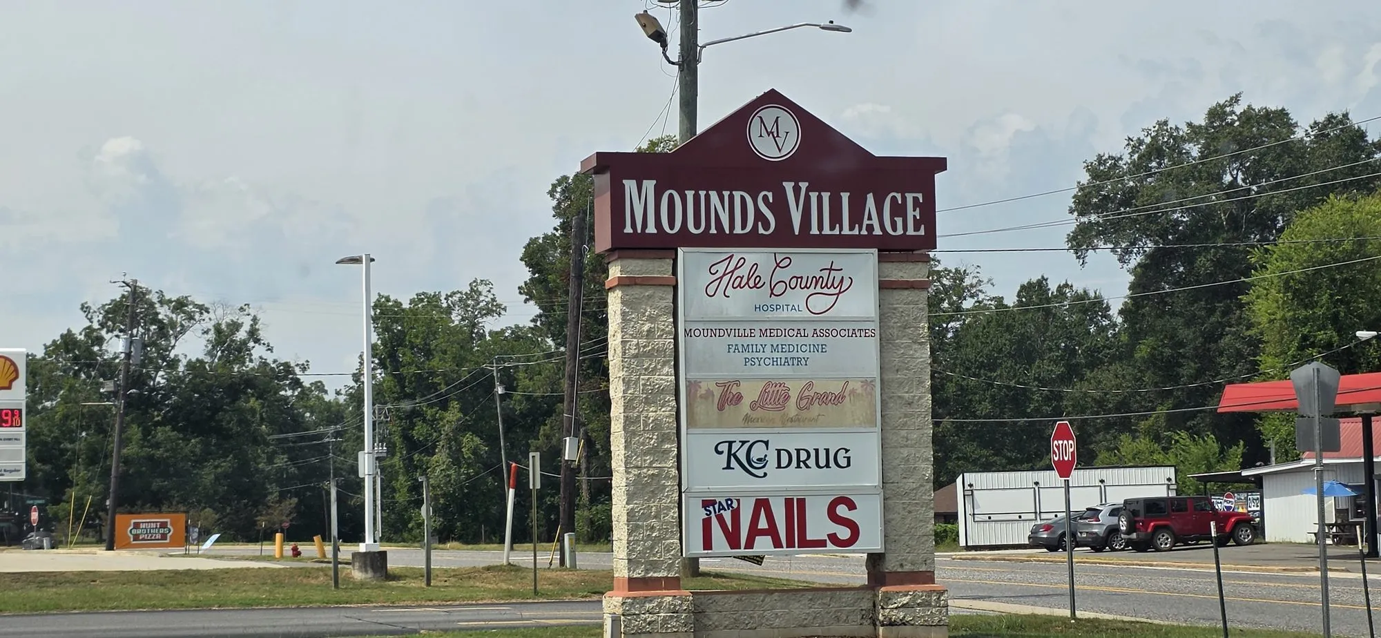 Mounds Village shopping center sign in Moundville