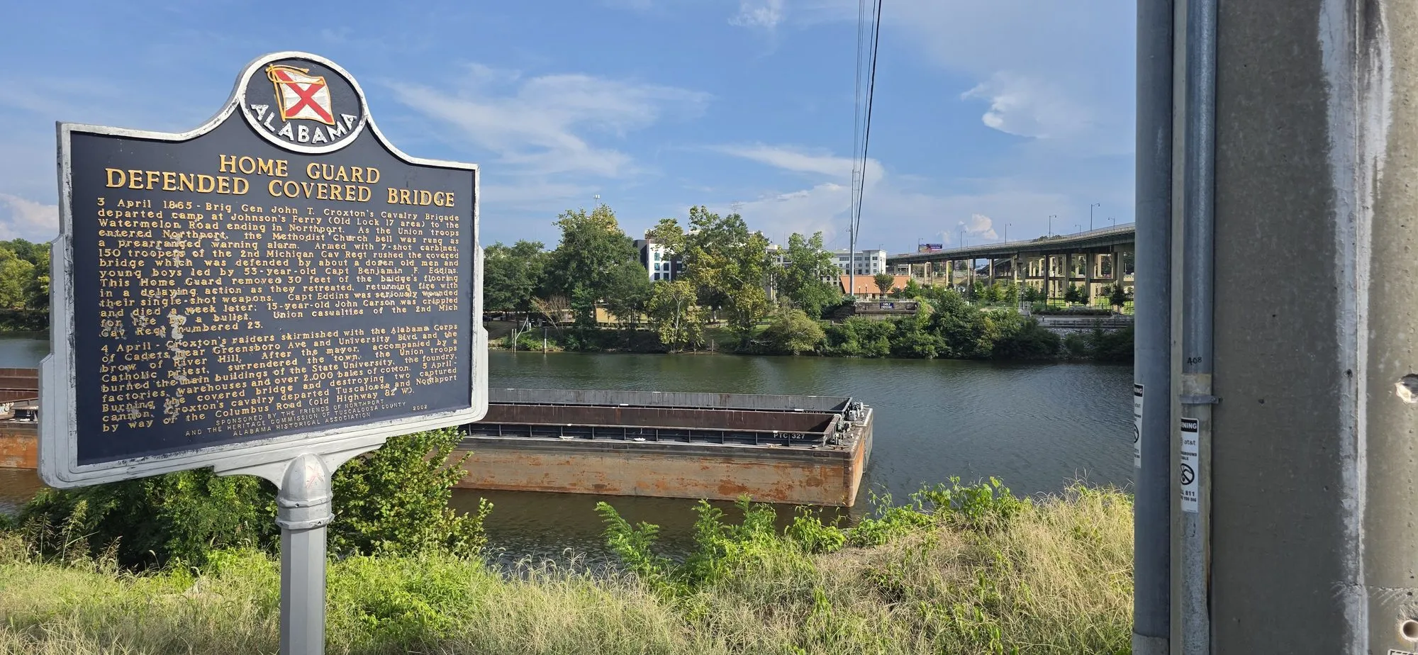 Alabama historical marker on the Black Warrior River bank at Northport