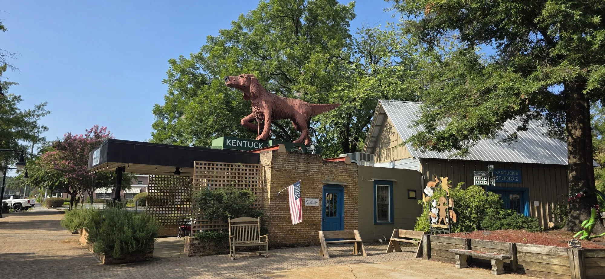 Shops and the dinosaur statue in downtown Northport