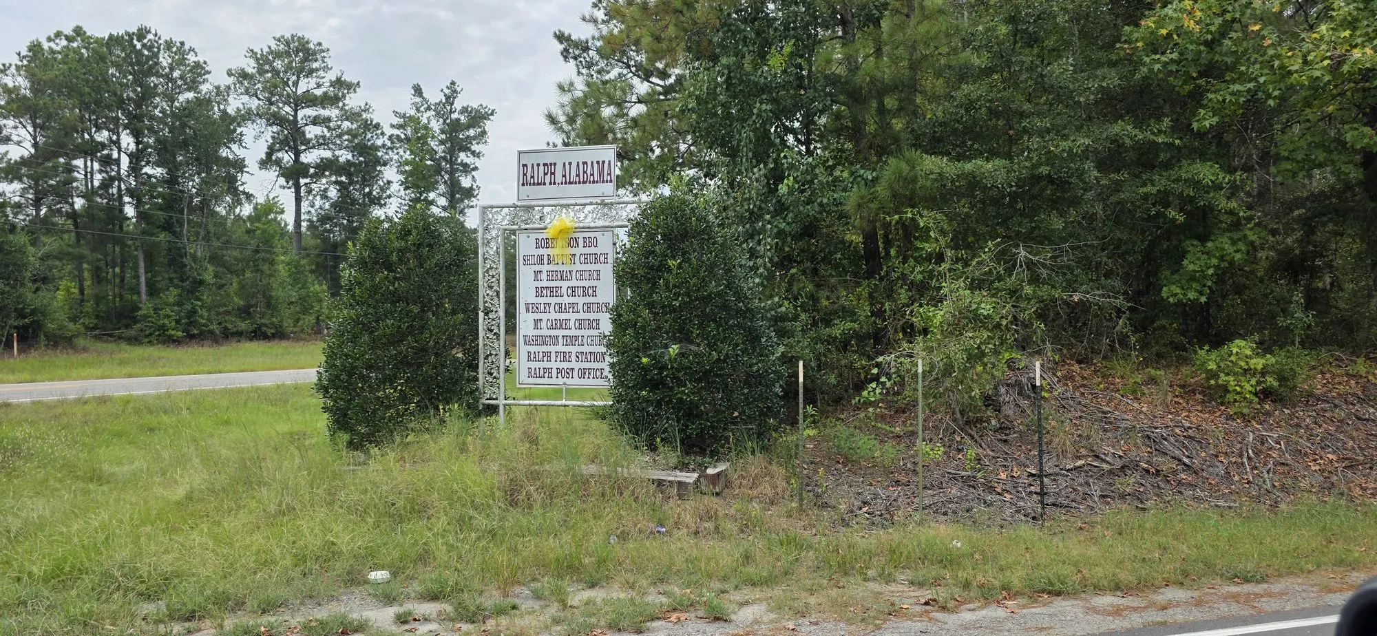 Ralph community sign listing local churches