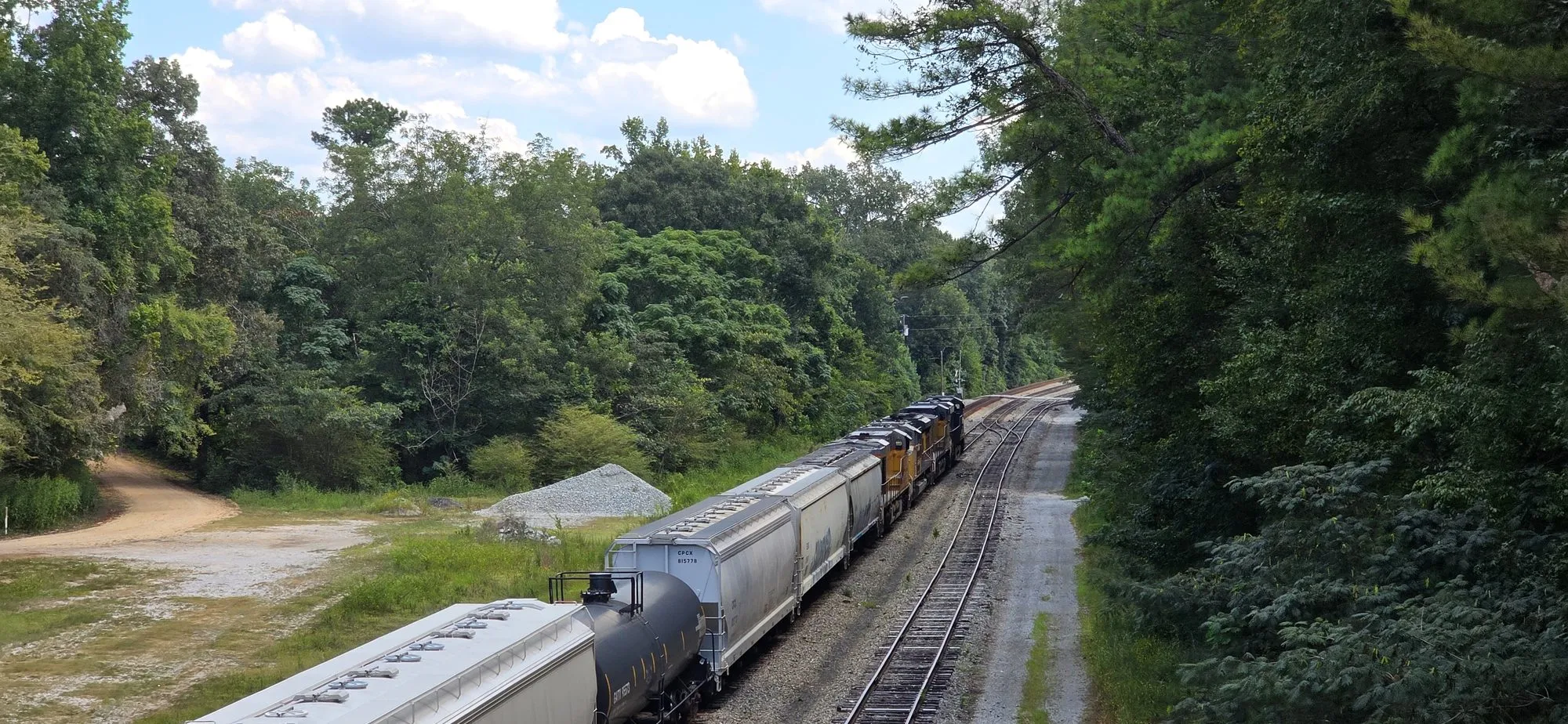 Freight train on the line through Woodstock, seen from the overpass